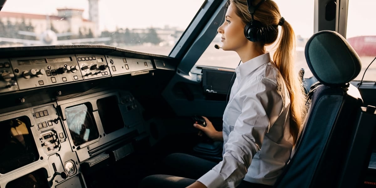 woman pilot in cockpit