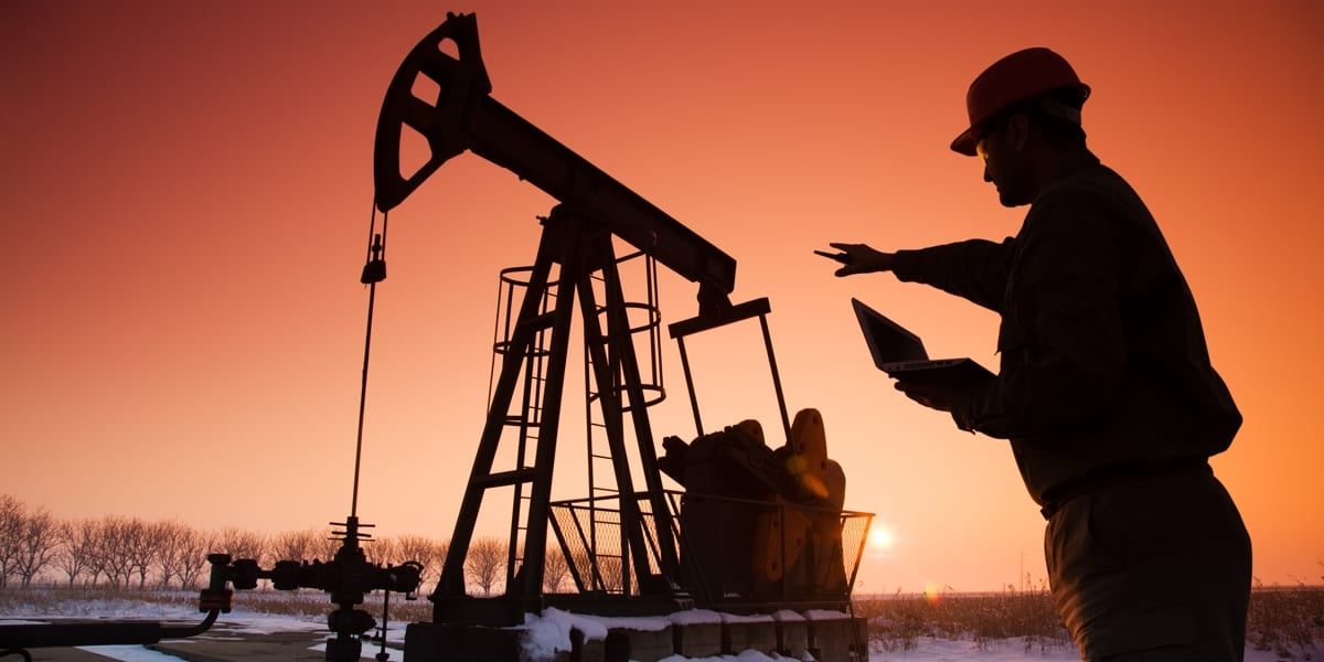 engineer pointing to equipment